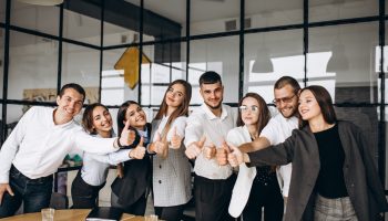 Group of people working out business plan in an office