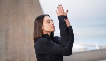 medium-shot-woman-meditation-pose (Large)